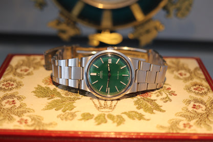 Omega 166.0173 Green dial Cal. 1012