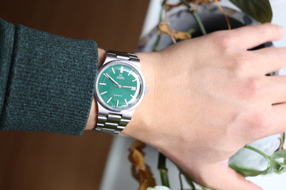 Omega 166.0173 Green dial Cal. 1012