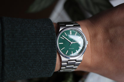 Omega 166.0173 Green dial Cal. 1012